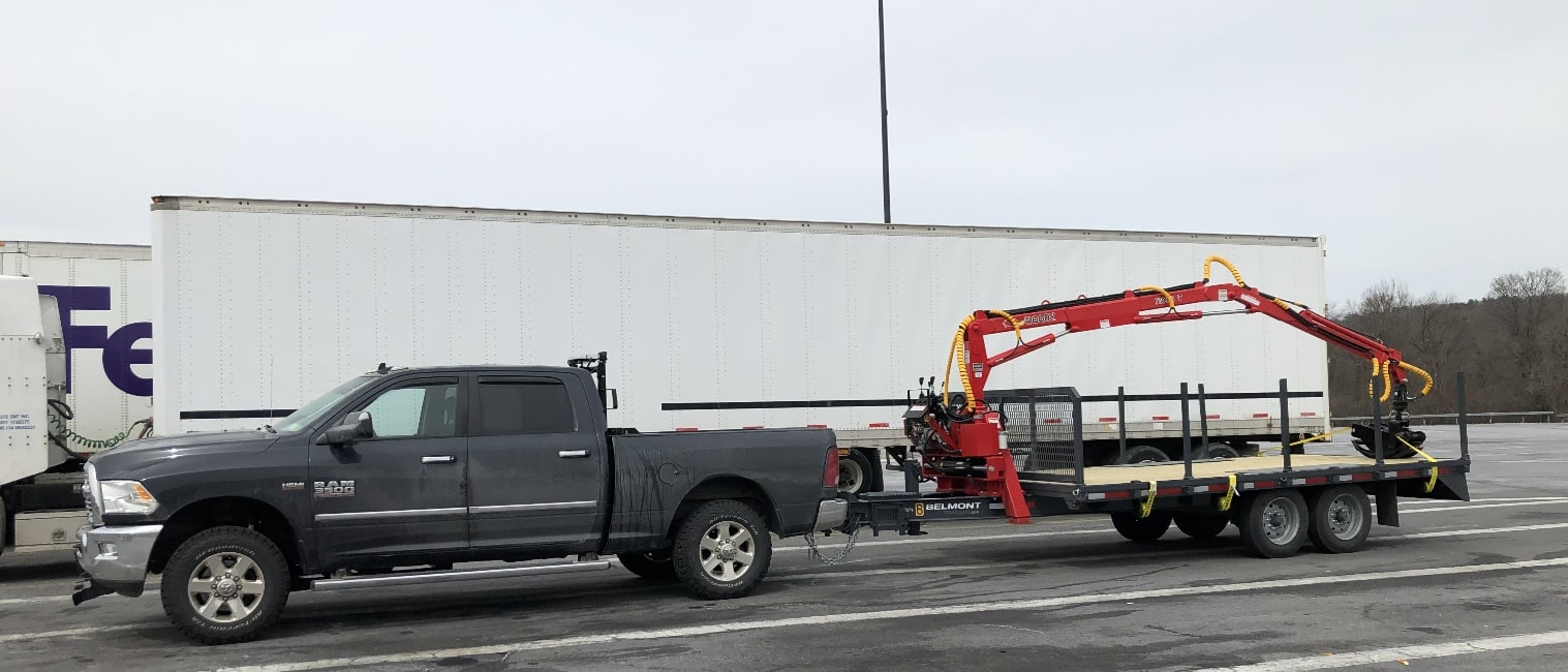 Stumpbusters truck and Belmont log-loader trailer
